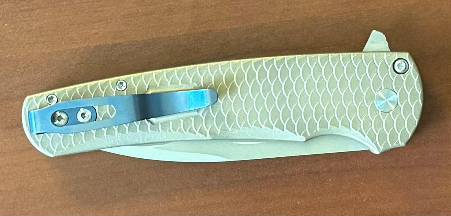 Pro-Tech-Pro-Tech Custom Malibu Blade Show Atlanta 2024 Exclusive Malibu - Distressed A1Bronze "Dragon Scale" Handle - Mike Irie Compound Hand Ground Mirror Polish Wharncliffe Blade - Mosaic Pin Push Button - Blue Titanium Clip /40-5-Urban Cutlery
