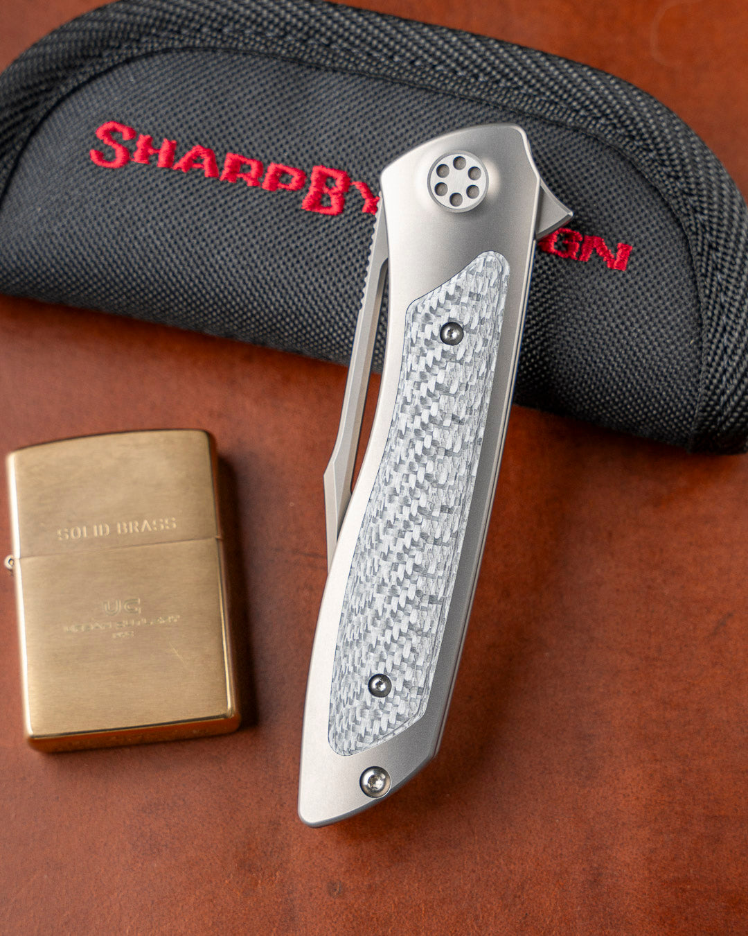Sharp by Design T10 – Silver Twill Carbon Fiber Inlay Handles - Etched & Slotted Blade