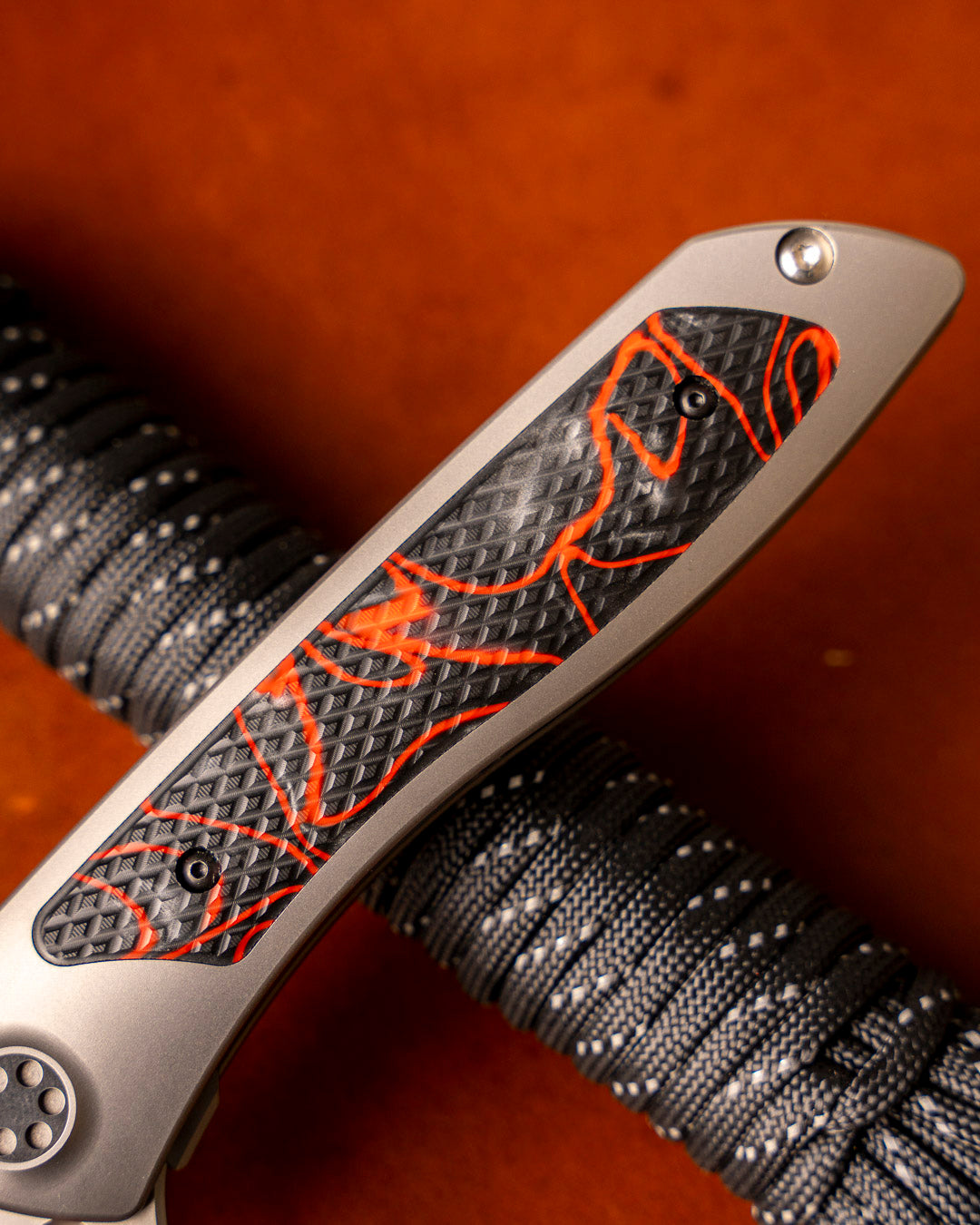 Sharp by Design T10 – Textured Lava Flow Kirinite Inlay Handles - Drop Point