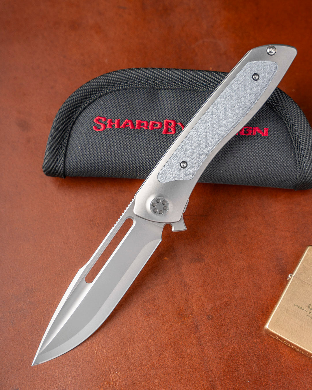 Sharp by Design T10 – Silver Twill Carbon Fiber Inlay Handles - Etched & Slotted Blade