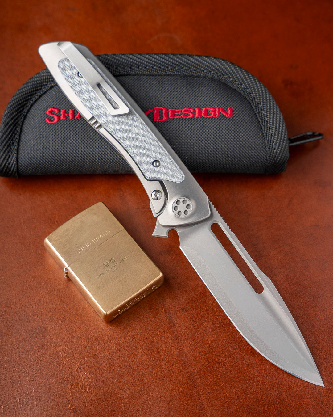 Sharp by Design T10 – Silver Twill Carbon Fiber Inlay Handles - Etched & Slotted Blade