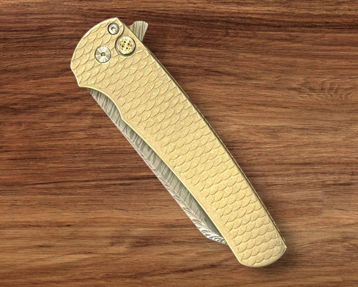 Pro-Tech-Pro-Tech Custom Malibu Blade Show Atlanta 2024 Exclusive Malibu - Distressed A1Bronze "Dragon Scale" Handle - Mike Irie Compound Hand Ground DAMASTEEL Reverse Tanto Blade - Mosaic Pin Push Button - Blue Titanium Clip /60-3-Urban Cutlery