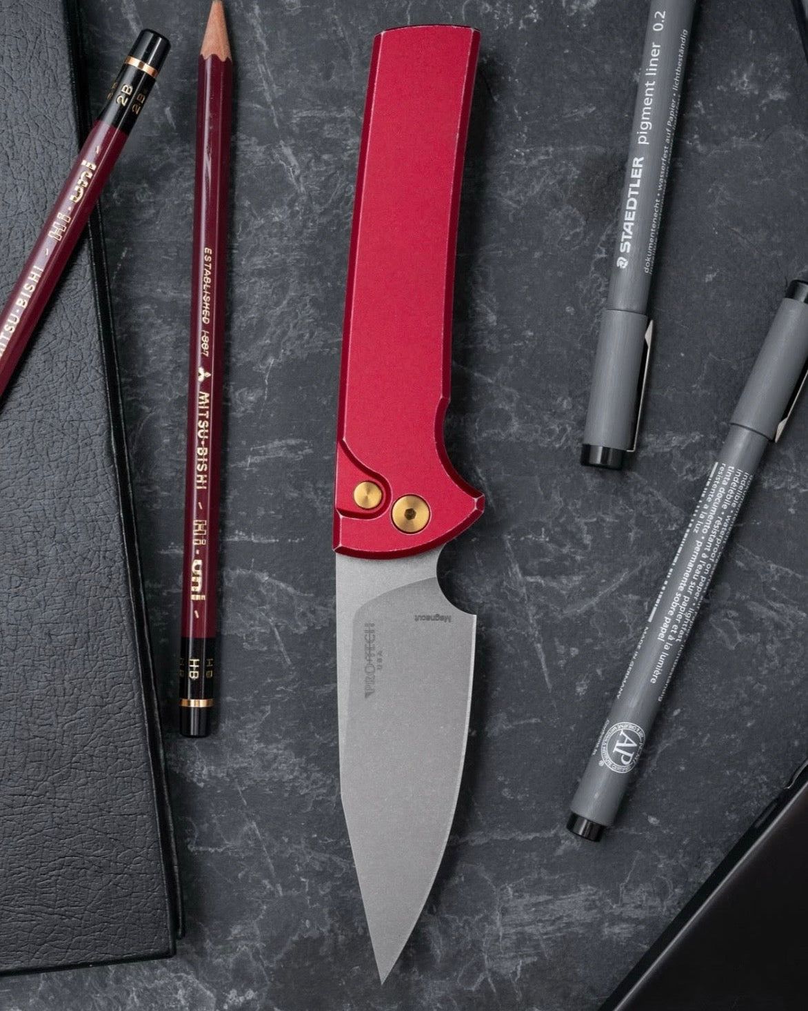 Pro-Tech-Pro-Tech x Chaves CCKSF26.ScapegoatF.1 CCKS Fall 2026 Exclusive Scapegoat Full-Size Auto - Battleworn Red Handles - Stonewash Magnacut Blade - Gold PVD Hardware - Gold Ano Titanium Milled Skull Clip /80-1-Urban Cutlery