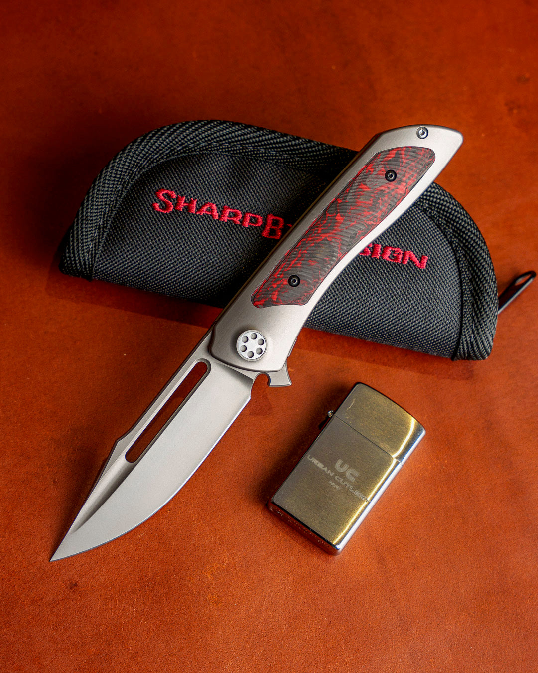 Sharp by Design-Sharp by Design Mini T10 – Inferno Red Carbon Fiber Inlay Handles - Slotted Harpoon Clip Point-1-Urban Cutlery