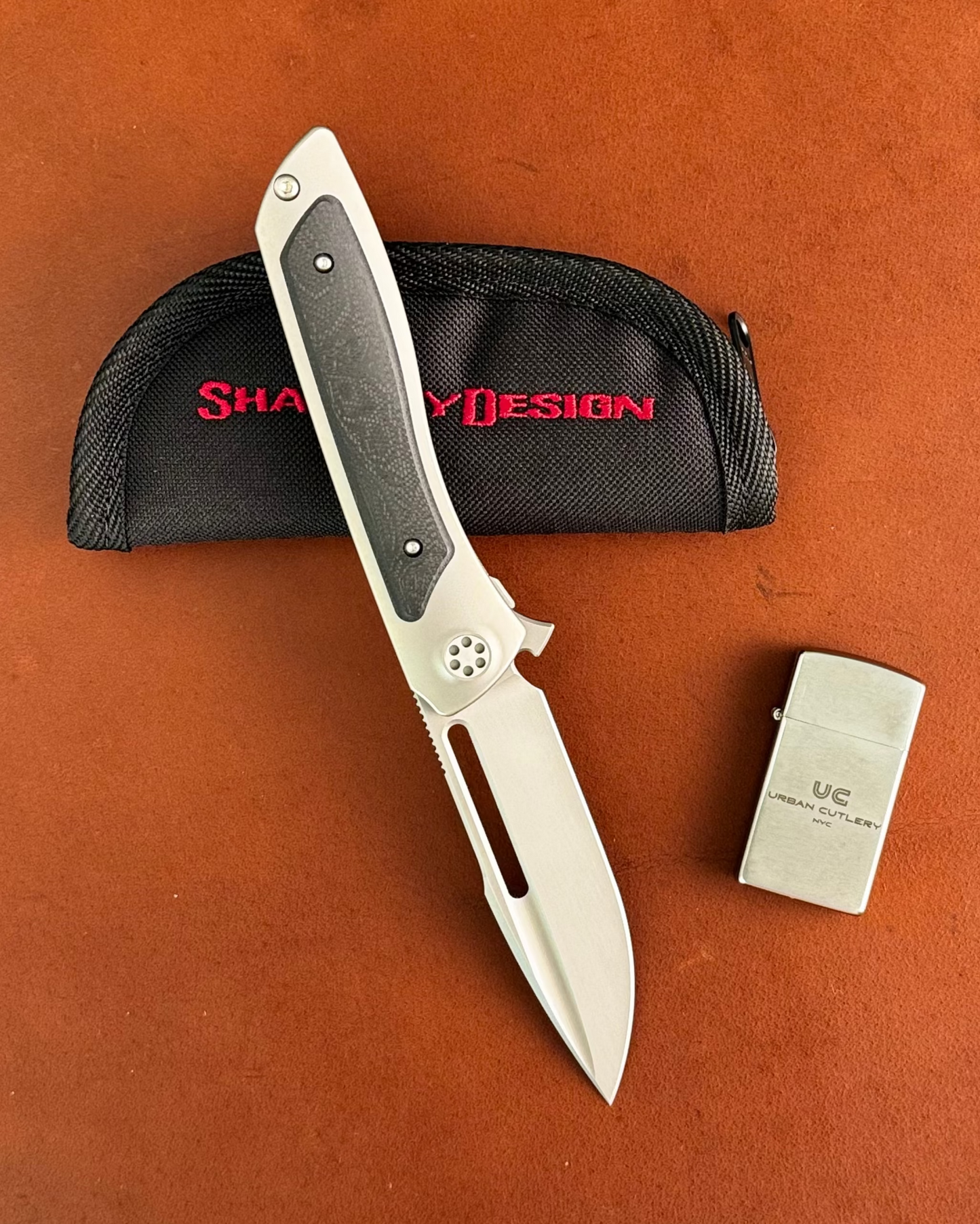 Sharp by Design-Sharp by Design T10 – Marble G10 Inlay Handles #9 - Slotted Blade-1-Urban Cutlery