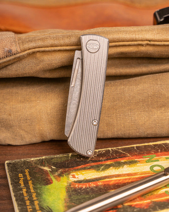 American Blade Works Slip Joint - Straight Line Pattern Titanium Handle - Magnacut Wharncliffe Blade