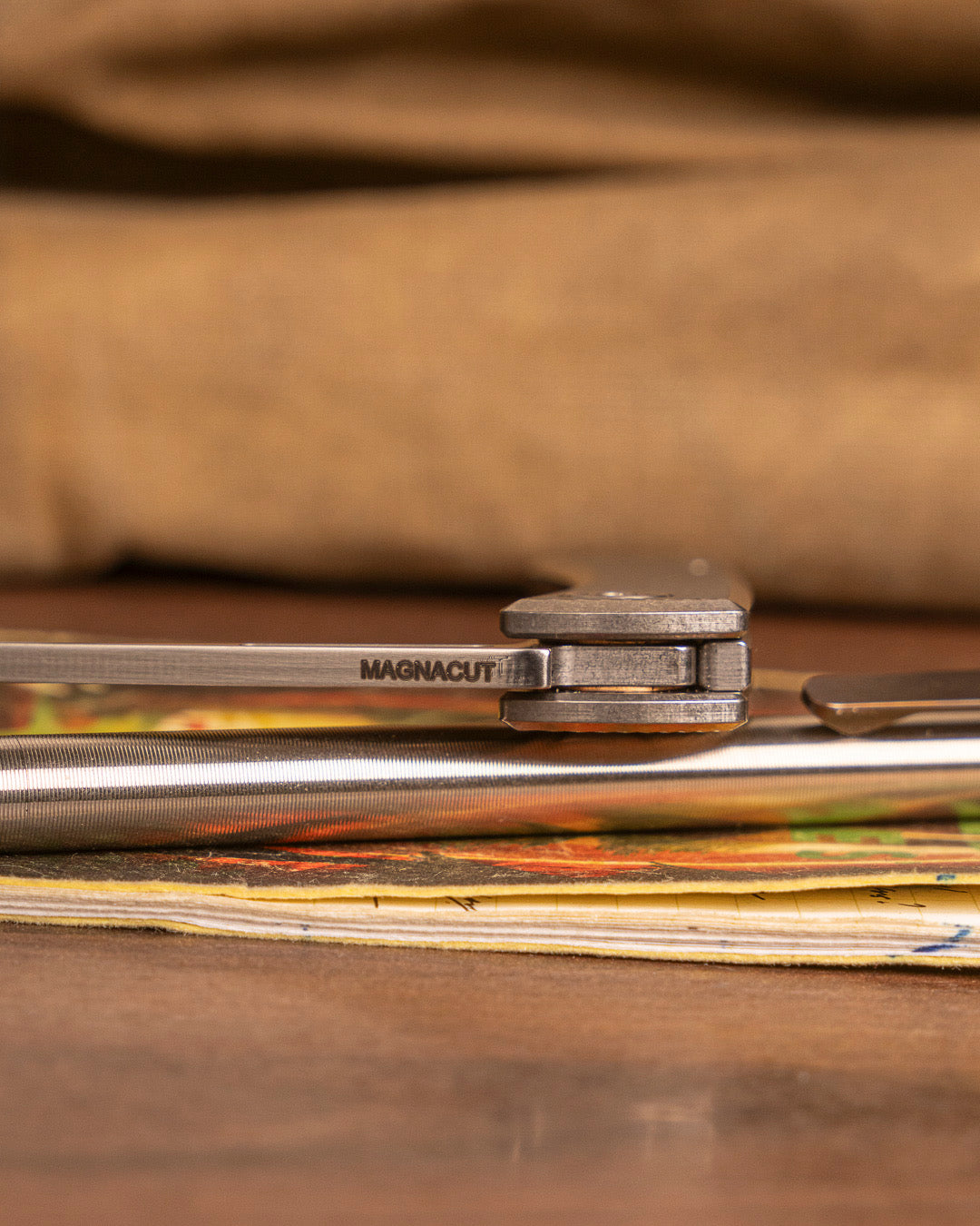 American Blade Works Slip Joint - Straight Line Pattern Titanium Handle - Magnacut Wharncliffe Blade